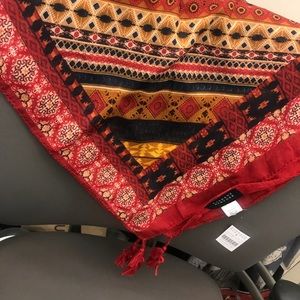 Barney’s multicolored tassel scarf